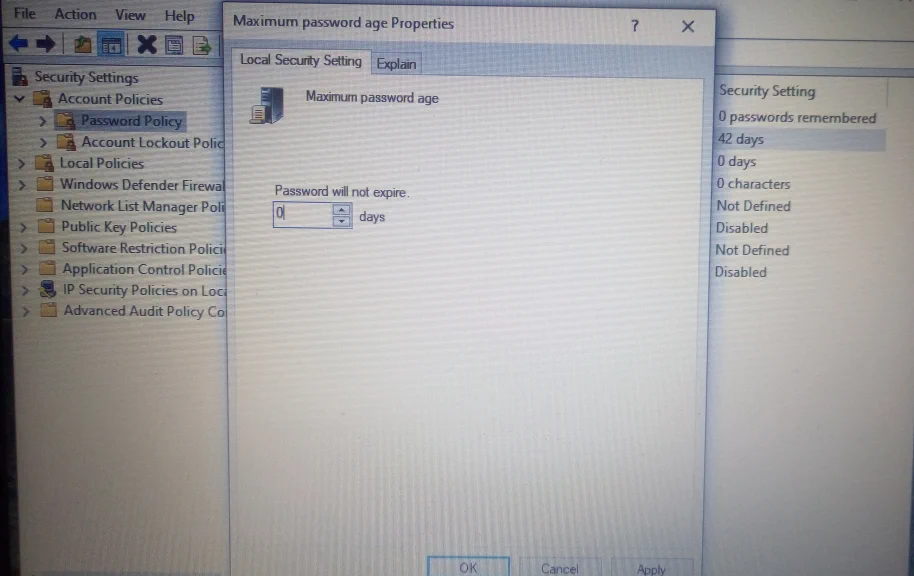 Local Security Policy, set Maximum password age to zero (no
maximum)